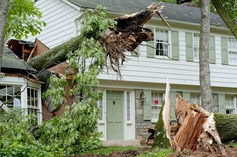 Residential storm damage repair and cleanup service in progress